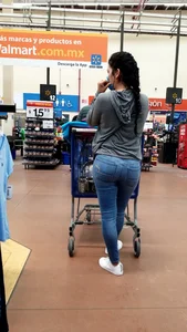Latina with a bubble butt in tight jeans….