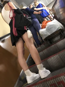 Candid girl in a skirt, low angle creepshots in a subway