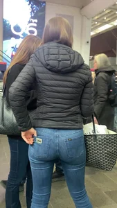 Nice big ass in tight blue jeans walking up stairs and standing in front of me