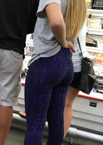 Blonde ass grocery shopping in blue and black leggings