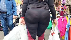 Milf with a tremendous hot ass in the market