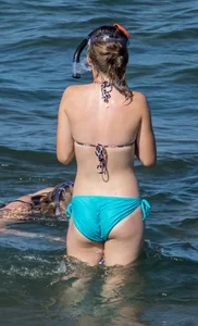 Another sexy girl on the beach snorkeling