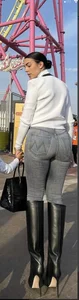 Milf in tight grey jeans and knee high boots with enormous heels, then in swimsuit