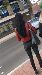 Chav brunette with a nice ass and vpl in tight black leather pants