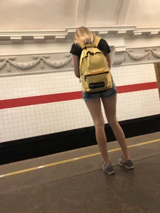 Cute Skinny Teen in Jean Mini Shorts Standing on the Subway Platform