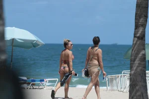 Big collection of various sexy girls on a beach in bikinis