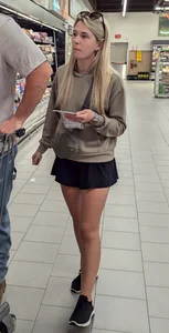 Cute petite wife with nice legs at the market (face)