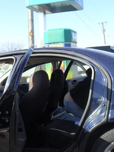 Girls cleaning their cars in jeans and pants