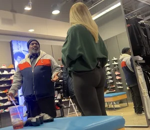 Blonde Finish line store worker in black leggings