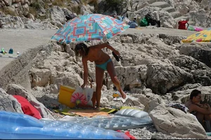 Nude girls on a beach in Hvar, Croatia