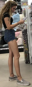 Tight petite Blonde in jean shorts