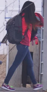 Girl next door teen walking to car in various tight jeans