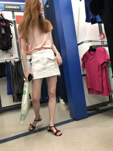 Redhead in Sandals and Skirt with Skinny Legs Candids