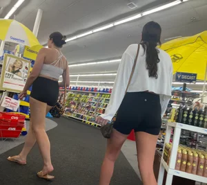 College girls at CVS with black yoga shirts and white tops