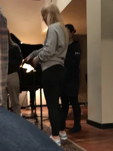 A hot blonde with beautiful smile and nice ass in leggings
