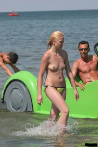 A bunch of sexy beach voyeur babes in bikinis, thongs and topless
