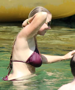 Two big boobed bikini babes in maroon bikinis