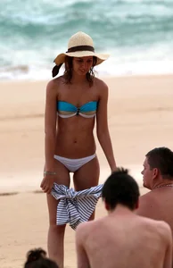 Cute beach girl with decent body in bikini