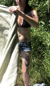 Someones girlfriend with nice tits in black bikini top and shorts