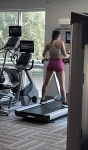Fit brunette on treadmill
