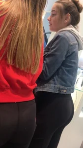 Skinny Girls in Tights at the Cash Register Store Candid Photos
