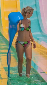 Blonde milf with a great bikini body at a water slide