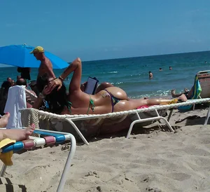 Hot Wet Girl With Great Ass Lying in Swimsuit on the Subbed Beach Candid Photo