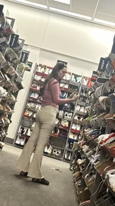 Brunette in flare leggings