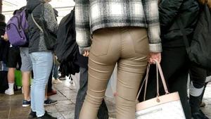 College girl in brown leather pants