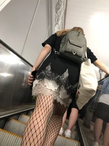 Cute Girl in Lacey Semi-Transparent Dress and Fishnet Pantyhose Subway Escalator Candid Photos Gallery