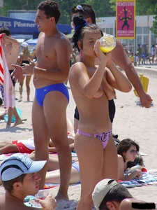 Sexy candid topless and nude beach girls