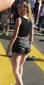 Girl showing some cheeks with a nice ass in pleather shorts