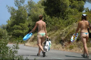 Nude girls on a beach in Hvar, Croatia