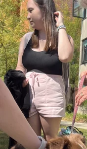 Busty chubby college girl at a dog park