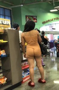 Latina with hard nipples and a big booty in tight spandex shorts outfit
