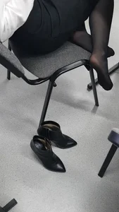 College Girl Sitting Shoeless with Her Feet on Chair in Black Pantyhose Classroom Creepshots