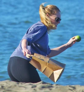 Beach blonde in leggings with a decent booty