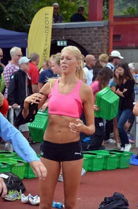Sexy blonde track sprinter changing after a race