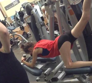 Skinny Girl in Mini-Shorts Working out in a Gym Hot Creepshot