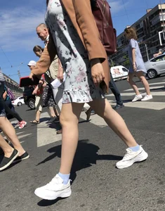 Candid hottie wearing a dress, great pale legs