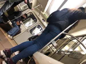 Nice Thin Legs and Small Booty in Blue Tight Jeans in the Subway Train Candid Pics