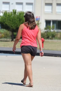 Thick girl in pink top and black shorts with vpl