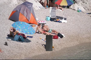 Nude girls on a beach in Hvar, Croatia