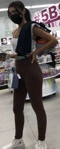 Slim latina in light brown leggings