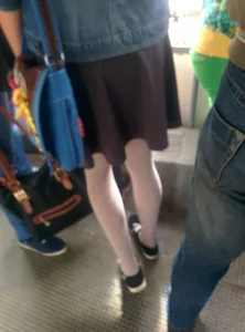 Candid Teen in a Skirt And White Pantyhose Public Bus Photos