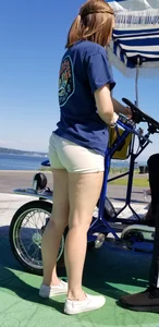 Bike rental girl in tan shorts with cute butt and great legs