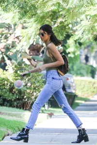 Kendall Jenner in West Hollywood with pokies and in tight jeans