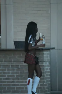 Sexy ebony Tilted Kilt employee in her uniform
