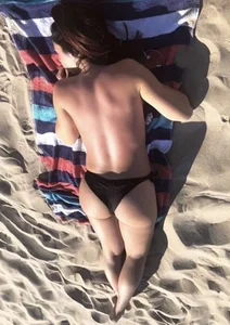 Beach topless candid girl
