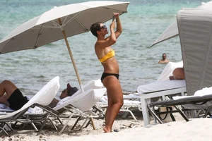 Frankie Bridge nip slips in a bikini on the beach